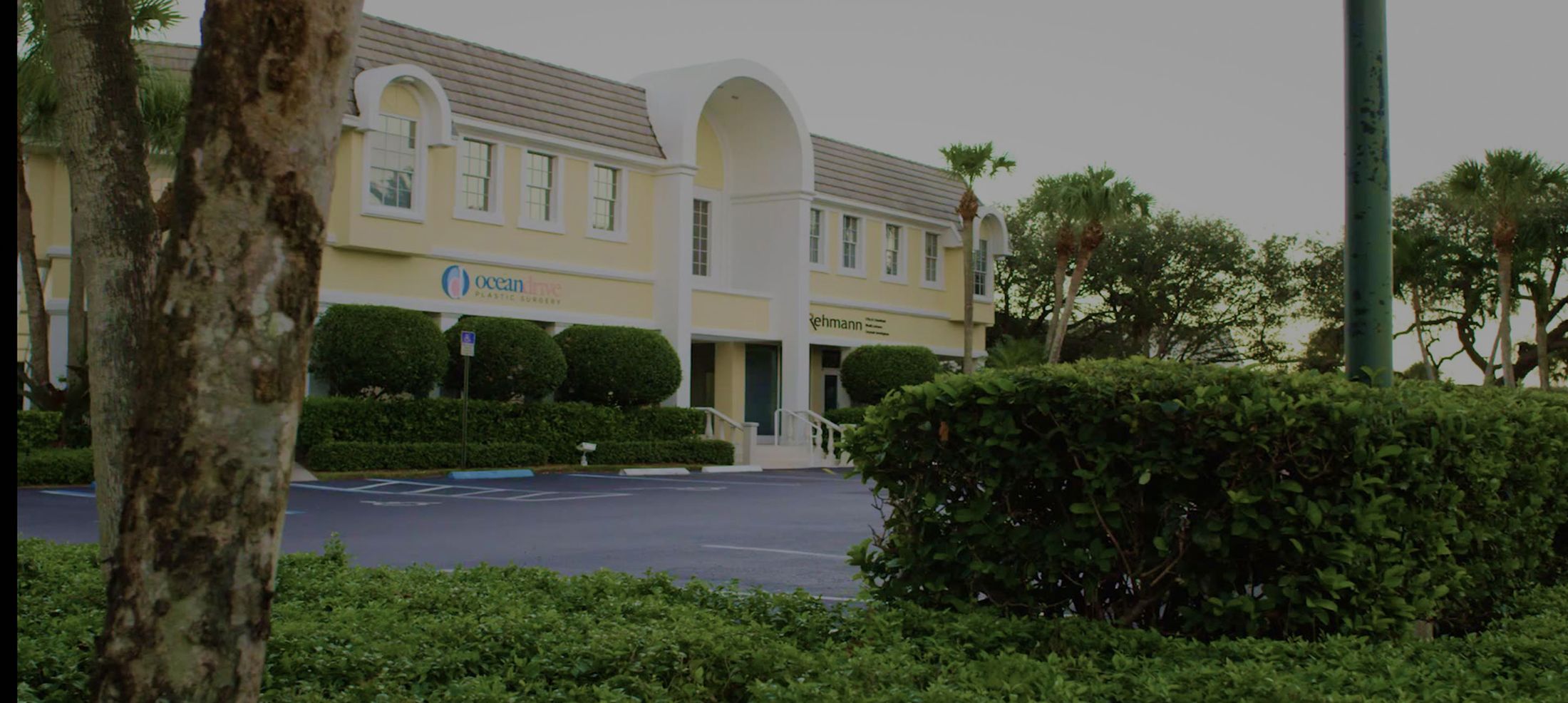 Plastic surgery clinic in a landscaped setting.