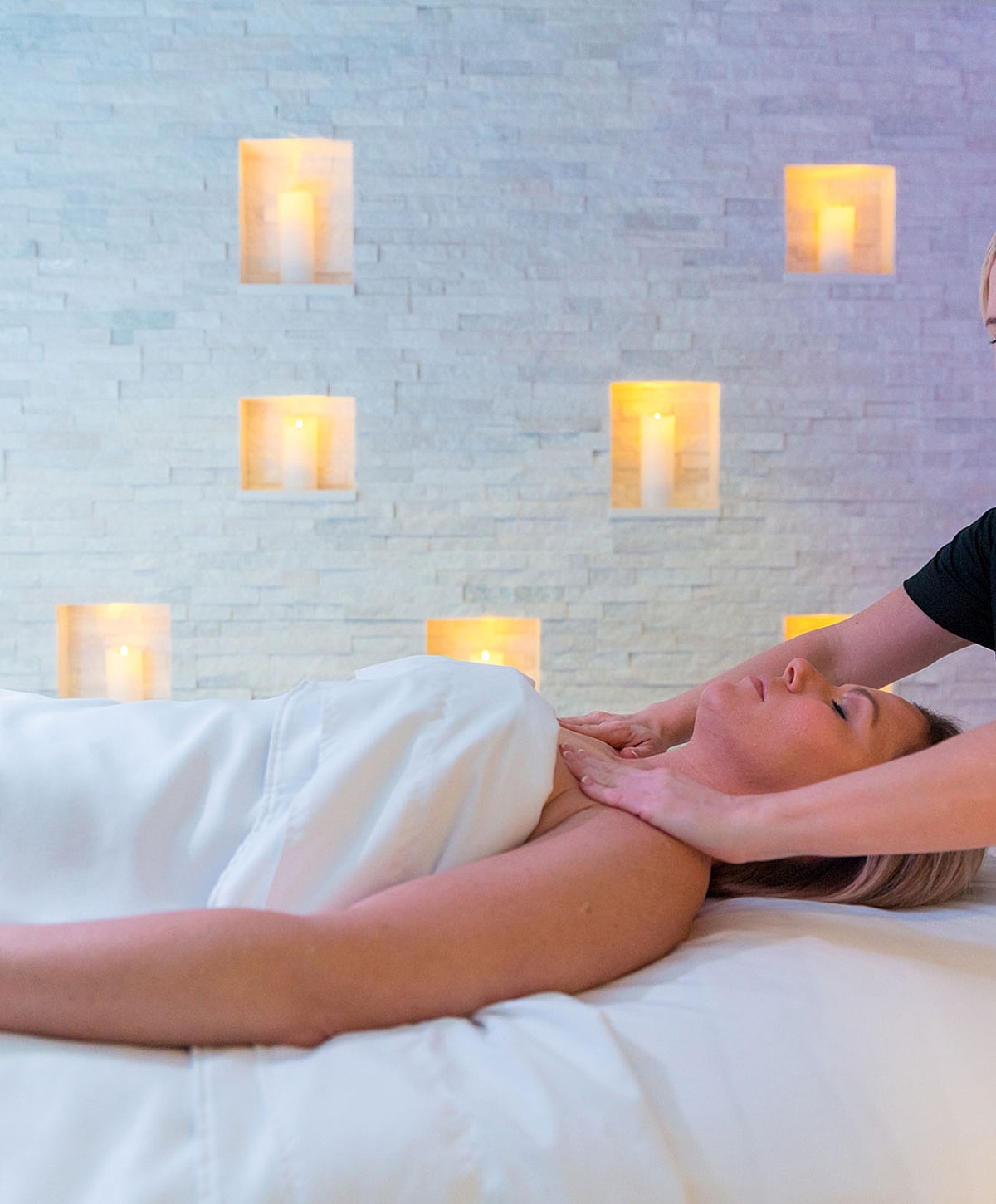 Relaxing massage in a serene spa environment.