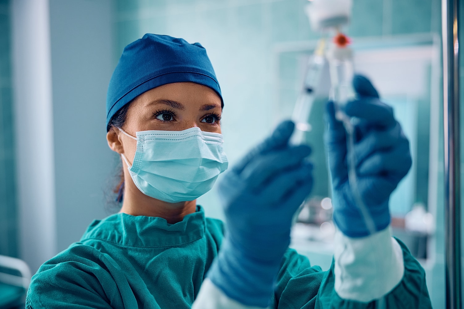 Medical professional preparing medication in hospital.