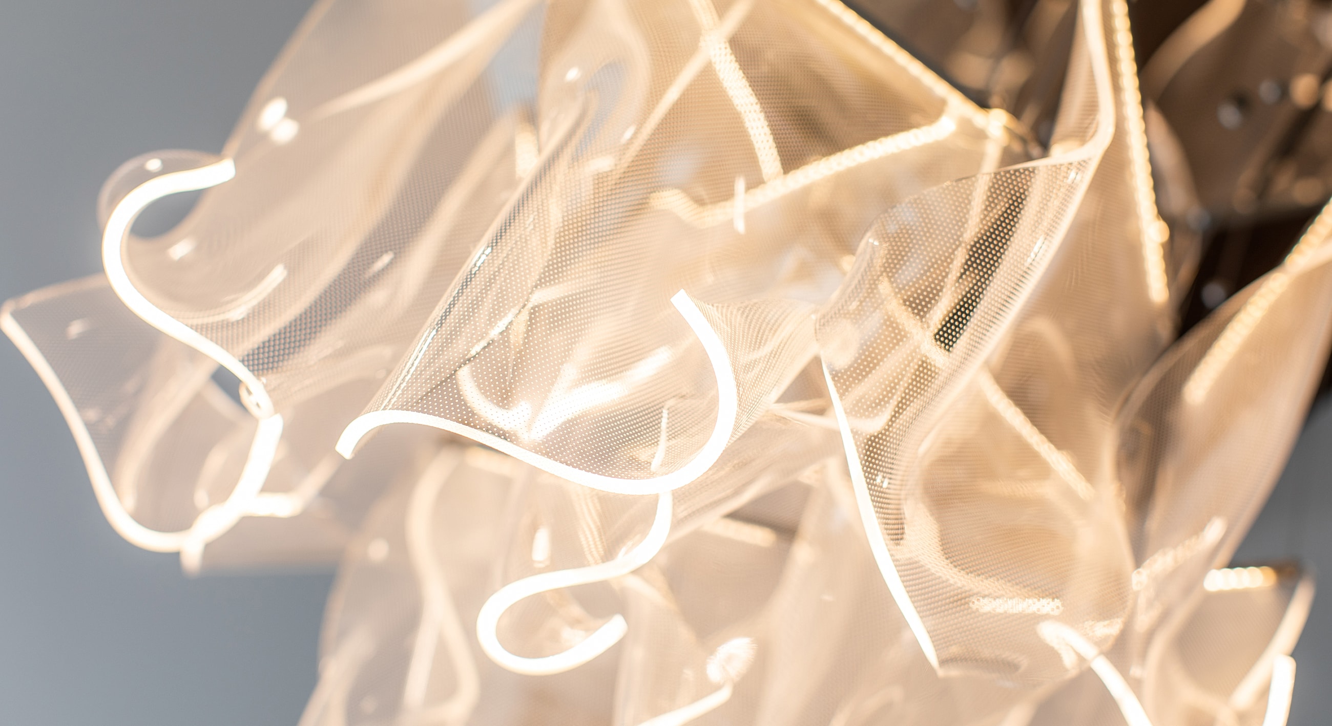 Aerial view of beach with umbrellas and crystal water.